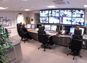 Group of monitors where employees are surveilling a business. 