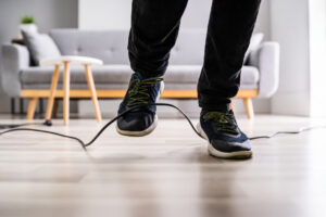 Tripping over a power cord - Not Safe workplace Tech