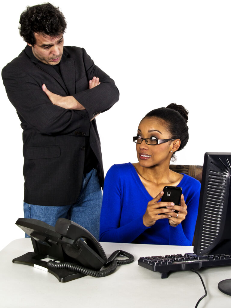women on cell phone at work